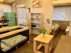 Postel nebo postele na pokoji v ubytování Glamping Tents - Camp Adriatic