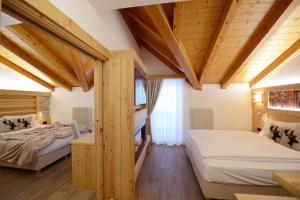 Postel nebo postele na pokoji v ubytování Hotel Gardenia