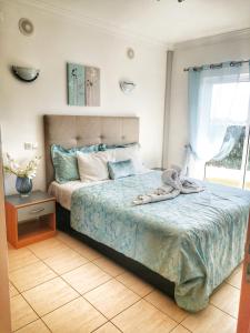 Ένα ή περισσότερα κρεβάτια σε δωμάτιο στο Penthouse With Sea View & Private Terrace +24 φωτογραφίες