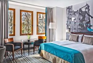 Posteľ alebo postele v izbe v ubytovaní Hotel Hanza