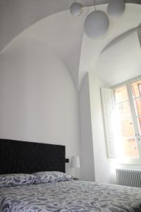 Posteľ alebo postele v izbe v ubytovaní Luxury Suite apartment Angiolieri