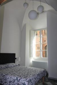 Posteľ alebo postele v izbe v ubytovaní Luxury Suite apartment Angiolieri