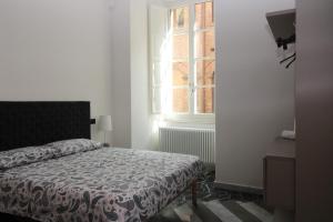 Posteľ alebo postele v izbe v ubytovaní Luxury Suite apartment Angiolieri
