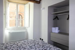 Posteľ alebo postele v izbe v ubytovaní Luxury Suite apartment Angiolieri