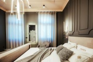 Ένα ή περισσότερα κρεβάτια σε δωμάτιο στο Espero Royal Stay