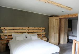 Posteľ alebo postele v izbe v ubytovaní Chalet Margoni