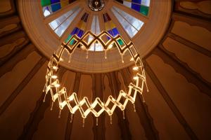 a chandelier hanging from a ceiling in a building at Skärva Herrgård in Karlskrona