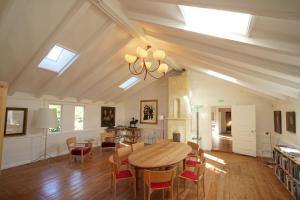 a dining room with a table and chairs at Skärva Herrgård in Karlskrona
