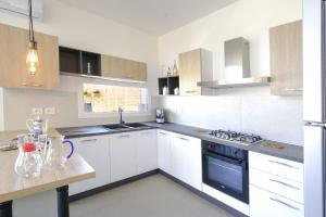 A kitchen or kitchenette at Essential suite