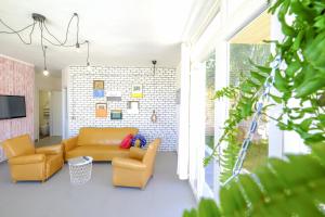 A television and/or entertainment centre at Essential suite
