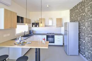 A kitchen or kitchenette at Essential suite