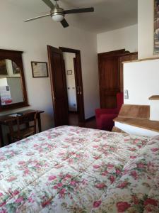 Posteľ alebo postele v izbe v ubytovaní Albergo Giovanni Da Verrazzano