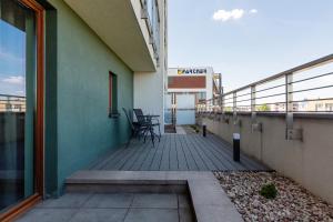 Balkón nebo terasa v ubytování Apartamenty Bliska Praga by Noclegi Renters