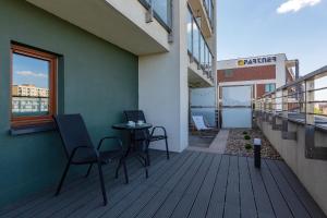 Balkón nebo terasa v ubytování Apartamenty Bliska Praga by Noclegi Renters