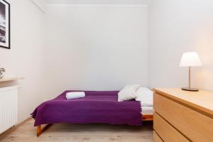 Postel nebo postele na pokoji v ubytování Apartamenty Bliska Praga by Noclegi Renters