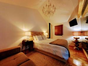 En eller flere senge i et værelse på Casa dos Jasmins by Lisbon Village Apartments