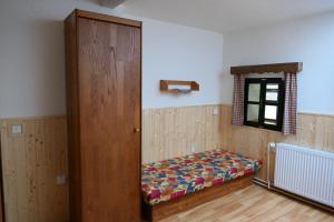 Postel nebo postele na pokoji v ubytování Cykloturistická Základna Lesovna