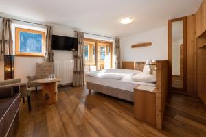 Postel nebo postele na pokoji v ubytování Garni Hotel Geier + 37 fotografií