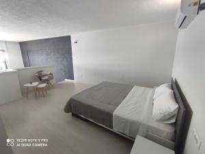 Postel nebo postele na pokoji v ubytování Marilia apartment