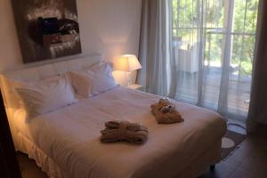Postel nebo postele na pokoji v ubytování Appartement à 50 mètres de la plage