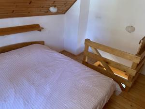 Ένα ή περισσότερα κρεβάτια σε δωμάτιο στο Apartments Nune