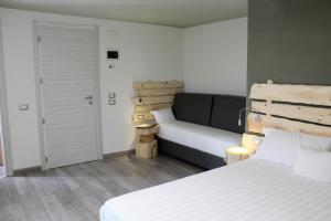 Posteľ alebo postele v izbe v ubytovaní Chalet Margoni