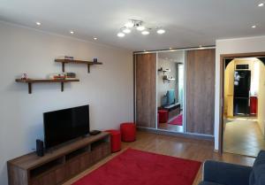 TV a/nebo společenská místnost v ubytování Apartament Orla