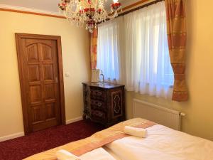 Letto o letti in una camera di Jáchymoff