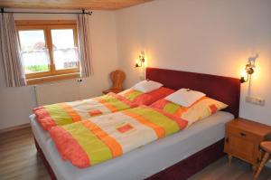 Cama o camas de una habitación en Ferienwohnung Baumgartner