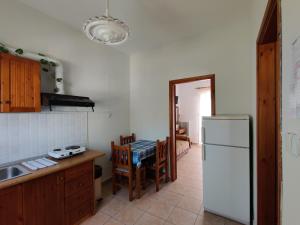 Kuchyň nebo kuchyňský kout v ubytování Maistreli Hotel Apartments