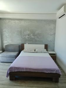 Postel nebo postele na pokoji v ubytování Apartments Mladenka