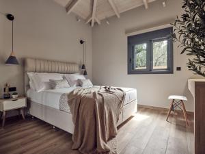 Llit o llits en una habitació de Villa Fabiana