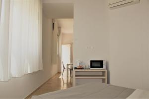 Posteľ alebo postele v izbe v ubytovaní Zibibbo Beach Apartments - Trapani