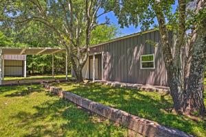 a rendering of a house with trees in the yard at Charming Quitman Cabin Less Than 2 Miles to Lake Fork in Quitman