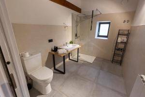 Koupelna v ubytování ARBELA Apartamentuak