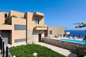 a villa with a view of the ocean at WONDERFUL ECO FRIENDLY VILLA AUGUSTINE in Ambelón