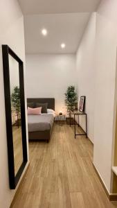 En eller flere senge i et værelse på studionapoli112