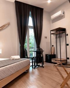 Postel nebo postele na pokoji v ubytování B&B Angolo83 Palermo centro