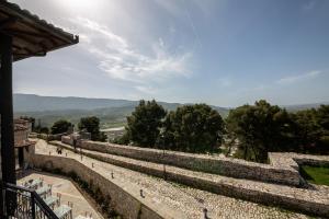 a view from the top of a stone wall at Berati Castle Hotel in Berat