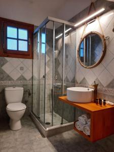 A bathroom at La Petri Studios with Fireplace & View
