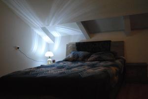Postel nebo postele na pokoji v ubytování Family Guesthouse - MACHARASHVILI