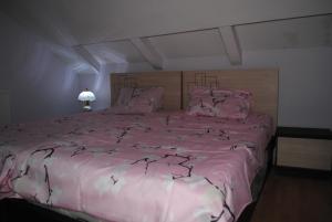 Postel nebo postele na pokoji v ubytování Family Guesthouse - MACHARASHVILI