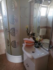 Koupelna v ubytování Apartman Grlić Obiteljski odmor