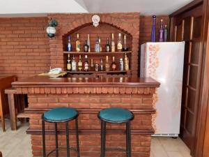The lounge or bar area at Caserón de Tejas