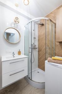 Ett badrum på Apartamenty SUNBEAM Gdańsk Śródmieście