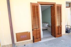 Ένα ή περισσότερα κρεβάτια σε δωμάτιο στο Monolocale in centro a due passi dal mare