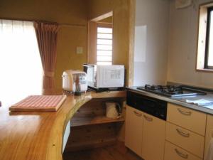 Virtuvė arba virtuvėlė apgyvendinimo įstaigoje Log house for 12 people - Vacation STAY 35063v
