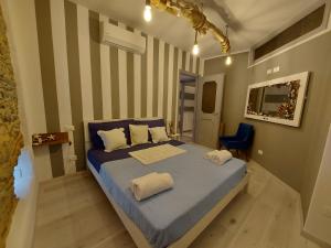 リオマッジョーレにあるCasa De Battéのベッドルーム1室(枕2つ付)