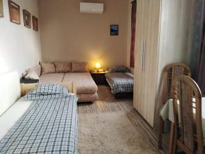 Posteľ alebo postele v izbe v ubytovaní Szederszem Apartman