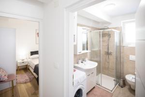 Koupelna v ubytování Apartmani Lelu